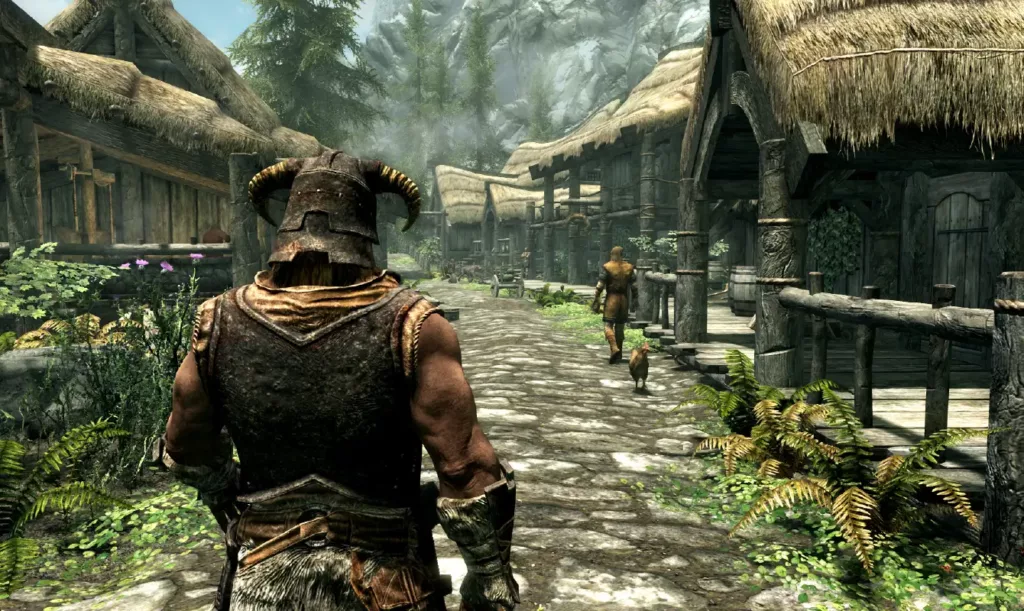 Screenshot of a player walking through a town in The Elder Scrolls 5: Skyrim.