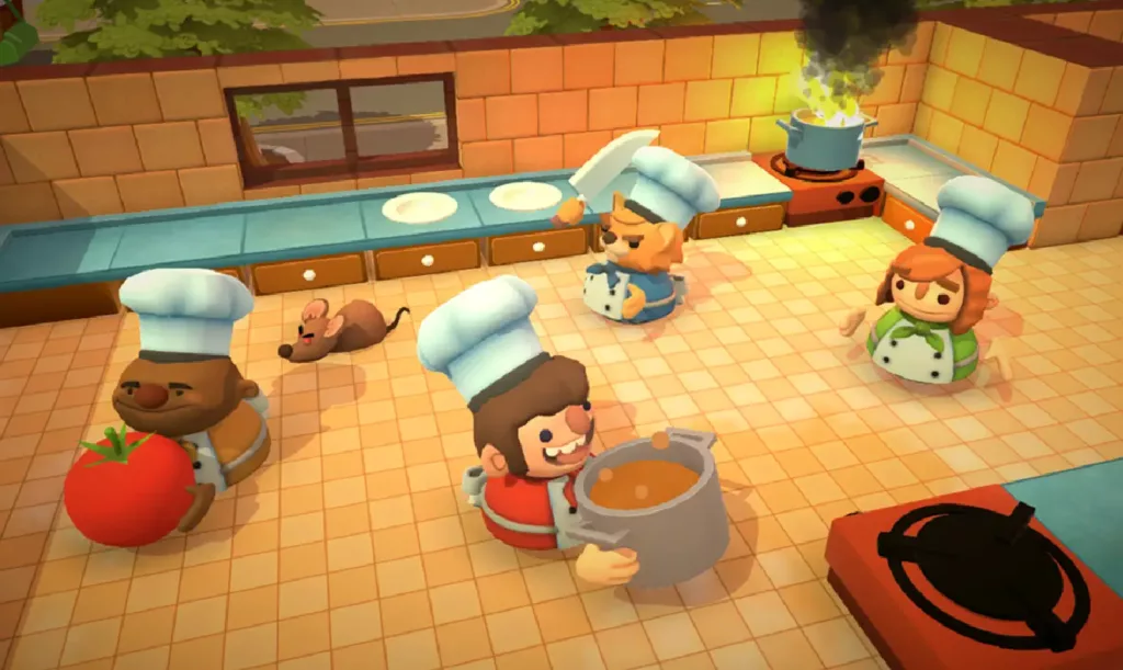 Screenshot of four characters in a kitchen in Overcooked.
