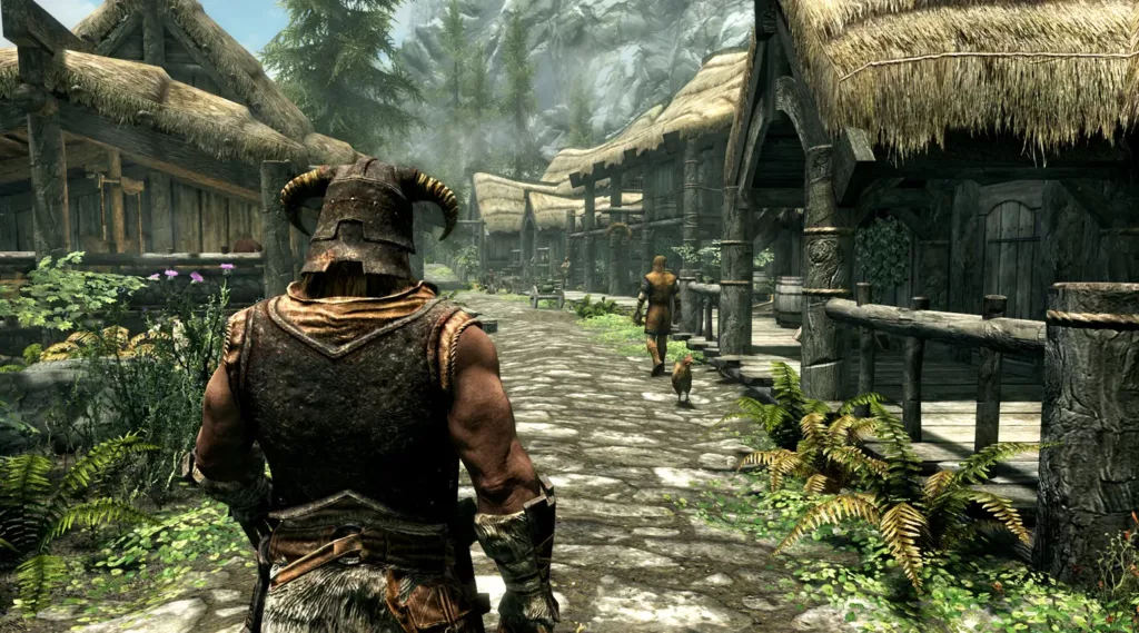 Screenshot of a player walking through a village in The Elder Scrolls V: Skyrim.